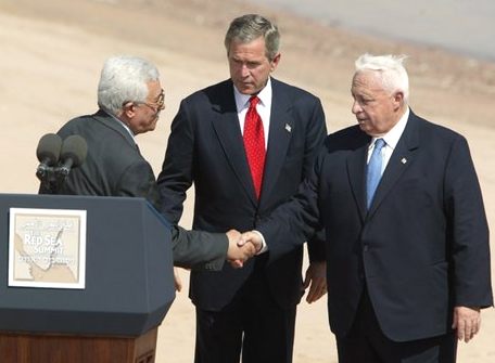 President of the Palestinian Authority Mahmoud Abbas, and former Israeli Prime Minister Ariel Sharon meet George Bush at the Red Sea Summit in Aqaba, Jordan