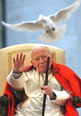 Pope John Paul and a dove flying symbolic of peace
