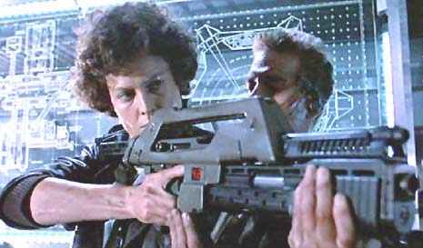 Ellen Ripley wielding a pulse rifle in Aliens