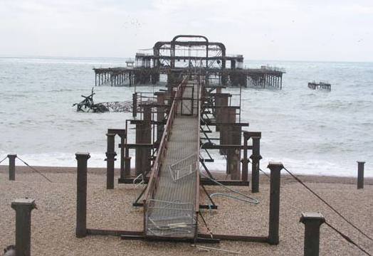 Charred remains of the once proud Brighton's west pier