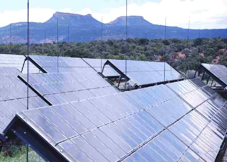 Solar panels at a solar farm generating clean electricity