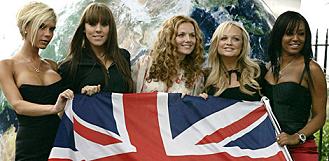 The Spice Girls flying a Union Jack flag