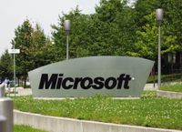 The Microsoft sign at the entrance of the German Microsoft campus, Konrad-Zuse-Str. 1, Unterschleißheim, Germany. Microsoft became an international company with headquarters in many countries.
