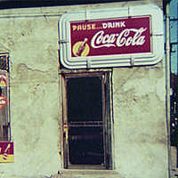 Store or Cafe with Coca Cola Soft Drink Signs - Marion Post Wolcott, photographer