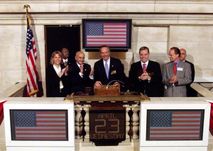  U.S. Secretary of Commerce Donald L. Evans rings the opening bell at the NYSE on April 23, 2003. Former chairman Richard Grasso can also be seen in this picture.