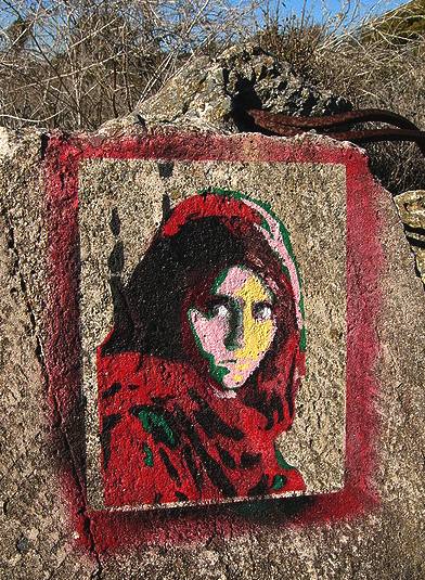 Afhan Girl, refugee Sharbat Gula, painted on rock