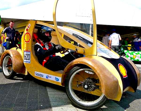 Eco car made of cardboard featuring scissor doors, sponsored by Shell