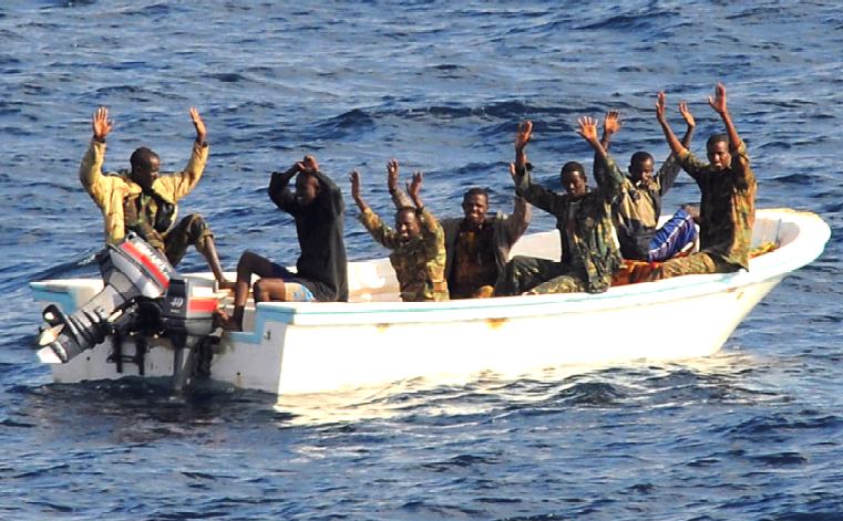 Pirates surrender, throwing weapons overboard - thanks for your cooperation