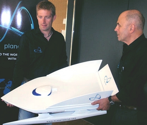 Raphael Domjan and Gerard d Aboville admire the development model of the Tûranor PlanetSolar