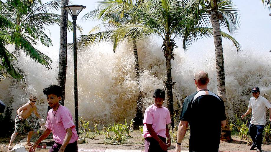 Tsunami breaking waves over Thailand in 2004