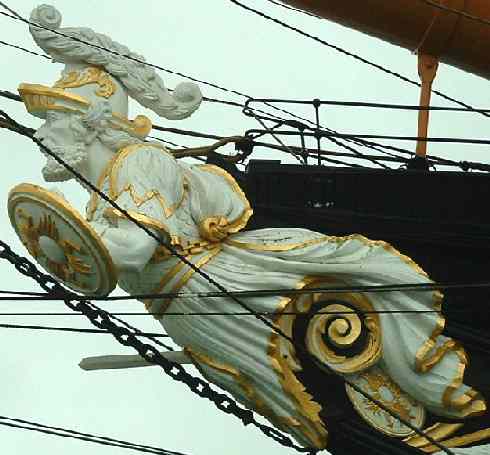 HMS Warrior's figure head, outstanding carved merman, white and gold