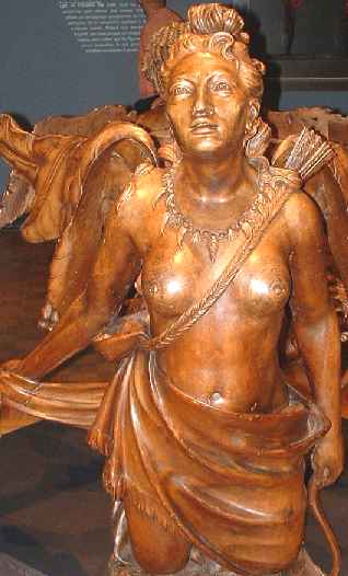 An outstanding carving of the female form in teak